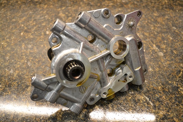 Milwaukee-8 Cam Install Instructions Backside view of M8 cam plate removed from engine